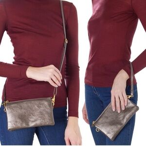 Wristlet wallet, gray with silver-tone hardware. Gently used, no defects.